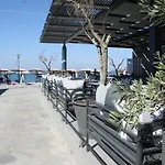 Meliton & By The Hotel